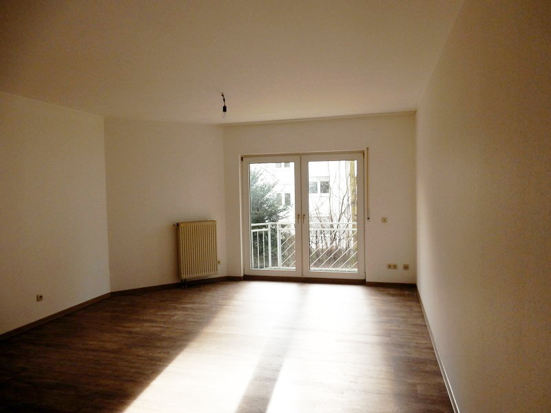 Wohnzimmer (Foto vor Vermietung)